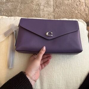 Purple coach clutch bag
